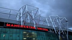 A view of Manchester United's Old Trafford stadium with dark clouds above as transfer plans are revealed